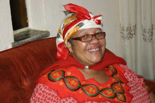 Margaret in her red traditional dress