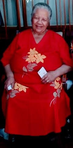 Margaret in her red floral dress