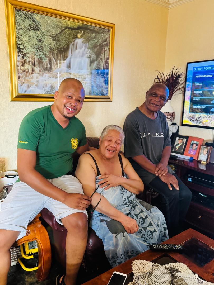 Margaret with family in the lounge